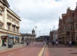 View toward Queen Victoria Square from Carr Lane. One cupola of the Hull Maritime Museum is visible centre-left; the white marble fa�ade of the Ferens Art Gallery is visible centre-right. Copyright David Wright.