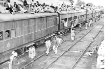 A refugee special train at Ambala Station during partition of India. Photo Division, Government of India. Public Domain.