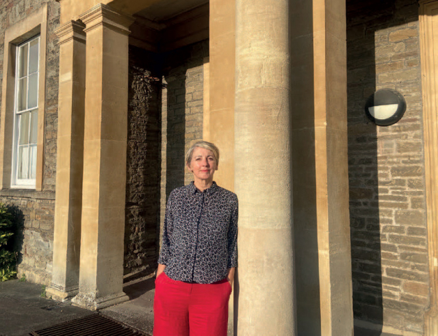 Kate Brooks outside one of the Muller buildings